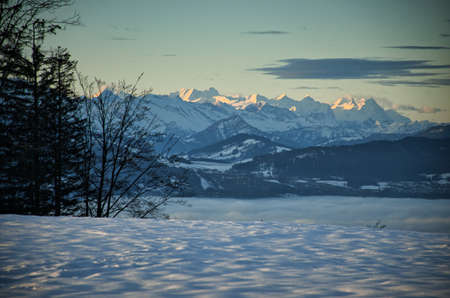 Morning mood in winter with a view of the mountains with the first sunlight, photo from the bachtel...