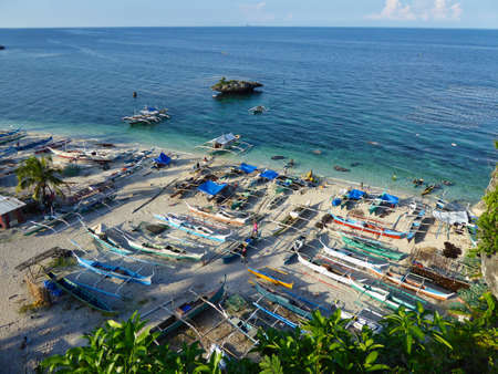 Port on a small Island with many fishing boats in the philippines