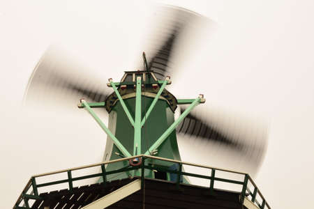 traditional dutch windmills change strength in the wind, netherlands