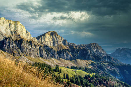 Swiss Alps mountain range by Storm weather, Churfirsten, Chaeserrugg, Hinterrrug, Schiebenstoll in Switzerlandの写真素材