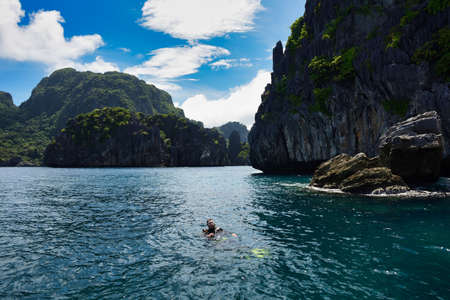 Diver at El Nido Palawan Paradise in the Philippines, Island hopping, dive spot, beautiful beaches...