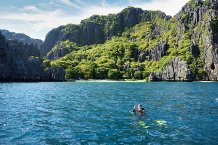 Diver at El Nido Palawan Paradise in the Philippines, Island hopping, dive spot, beautiful beaches ,cliffs, natureの写真素材