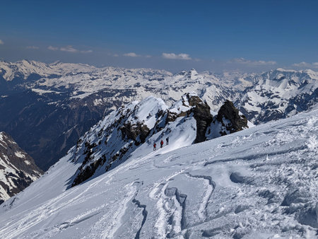 ski tour in the swiss mountains with a fantastic view of the snowy mountains. Urnerboden piz russein...