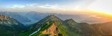 sunset on the mountain speer. Beautiful mountain panorama from the Glarus Alps to Lake Zurich. View of the federispitz.の写真素材