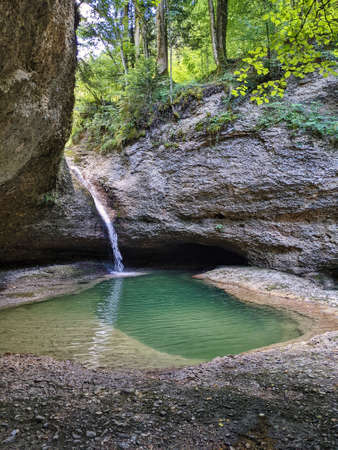 beautiful waterfall Buri in Fischenthal, Zurich Switzerland. Pouring in toss. jump into the water. Nature. Rockの写真素材
