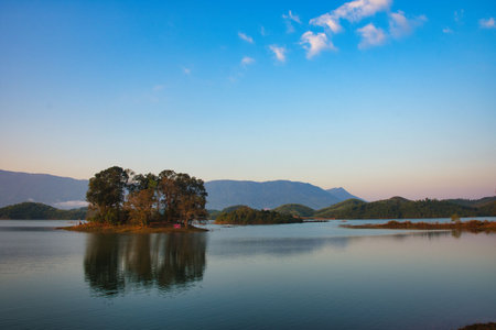 Island at Nam Ngum Reservoir, Tha Heua, Laos, Asien. Beautiful nature at Lake close to Vientianeの写真素材