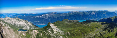 Mountain panorama from the Faulhorn. View of Hardergrat and Lake Brienz. Fantastic view. Hiking in the Swiss mountains. High quality photoの写真素材