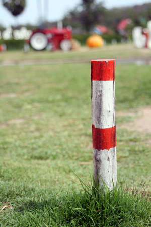 Wooden pole painted red and whiteの写真素材