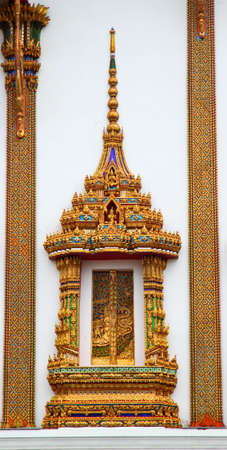 Sculpture around window of Charor temple, Nonthaburi district, Thailand.の写真素材