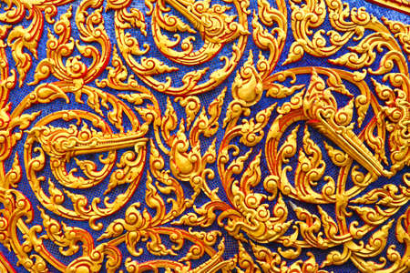 Dragon head texture on wall of monastery, Charor temple, Nonthaburi district, Thailand.の写真素材