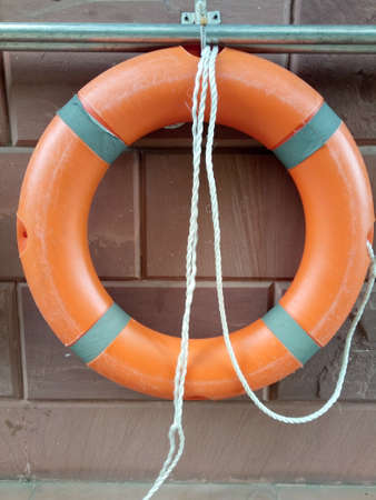 Orange rubber rings for helping people fall into the water.