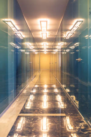 Modern Office interior with reflections on the floorの写真素材