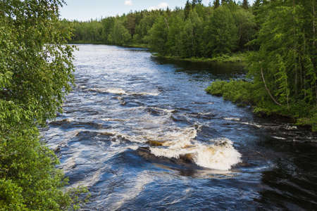 Wild river in forest in karelian republic in Russia