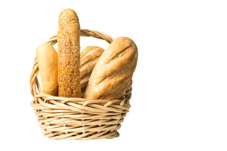 Composition with bread and rolls in wicker basket isolated on white backgroundの写真素材