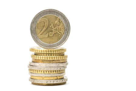 Stack of Euro coins isolated on white background.の写真素材