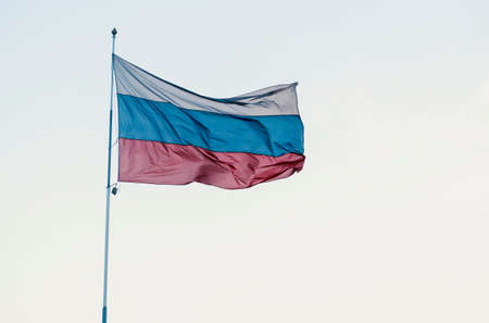 Russian tricoloured flag waving in the wind.の写真素材