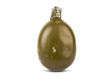 Old military flask isolated on a white background.の写真素材