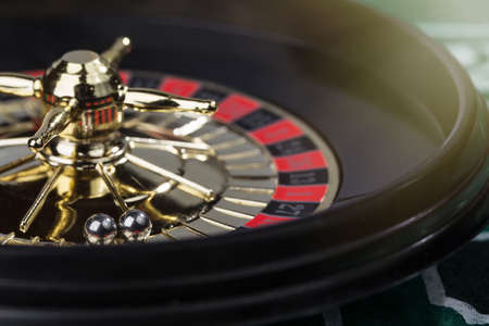 Image of decorative casino roulette. Focus on balls.