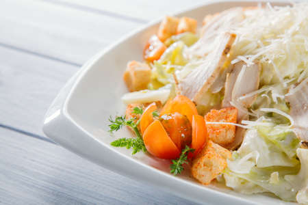 Healthy green organic caesar salad close up.の写真素材