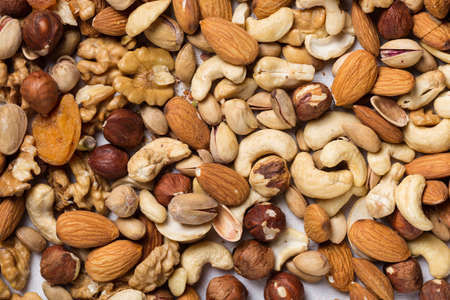 Backround from various kinds of nuts almond walnut hazelnut cashew Brazil nuts