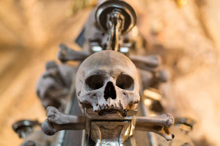 Ancient human skull and bone decoration in Sedlec, Czech republic. Kutna Hora.の写真素材