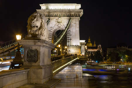Szechenyi Chain Bridge at night in the city of Budapest, Hungary.の写真素材