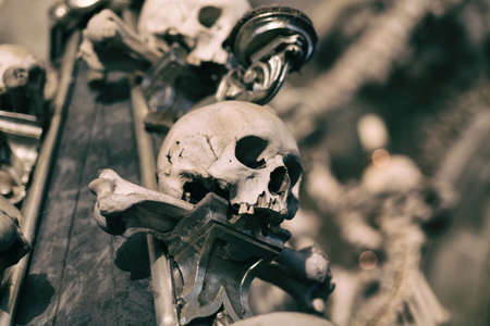 Ancient human skull and bone decoration in Sedlec, Czech republic. Kutna Hora.の写真素材