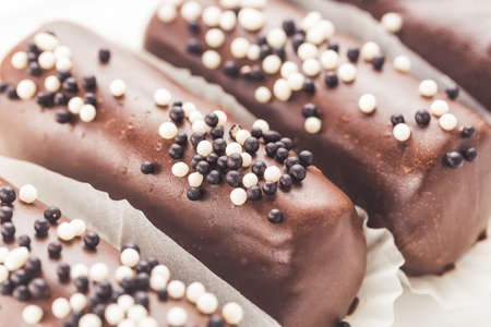 Potato chocolate cake with sweet balls. Close up toned image with selective focus.の写真素材