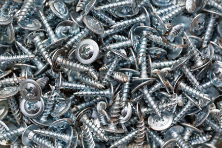 Background of many drywall screws close up.の写真素材