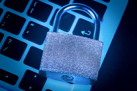 Padlock on keyboard. Internet data privacy information security concept.