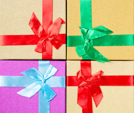Colorful gifts box as a background close up.