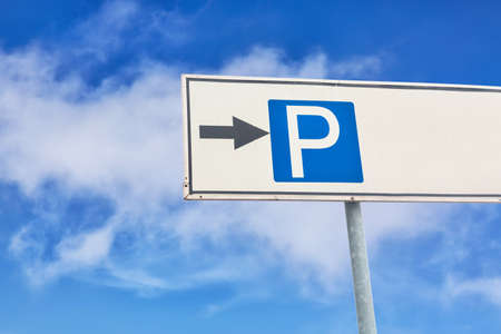 Parking symbol over a blue sky backgroundの写真素材