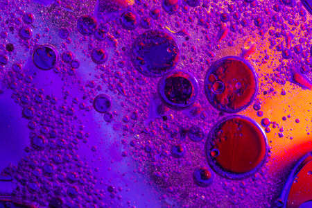 Colorful abstract background. Water colorful droplets on glass. Amazing abstract water drops on...