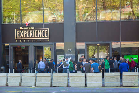 Amsterdam, Netherlands - May, 2018: The Heineken Experience brewery with visitors and tourists. Historic brewery for internationally distributed Dutch pilsner, Heineken beer in Amsterdamのeditorial素材