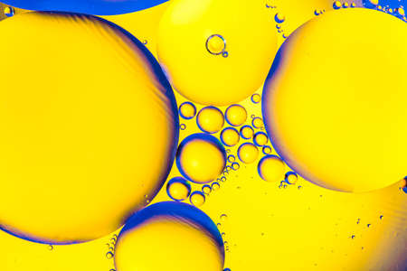 Abstract background with colorful gradient colors. Oil drops in water abstract psychedelic pattern...