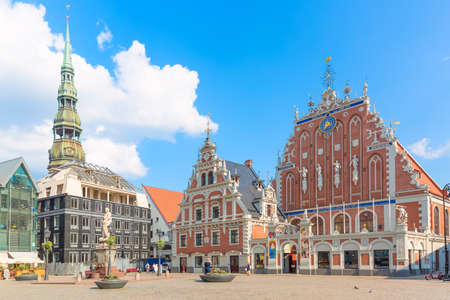 View of the Old Town square, Roland Statue, The Blackheads House and St Peters Cathedral against...