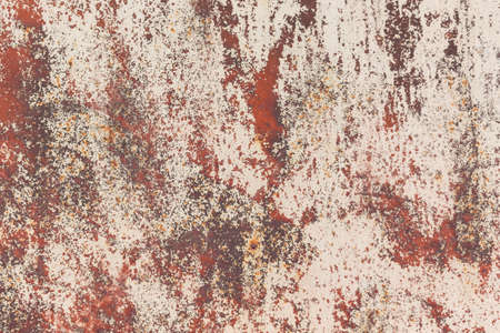 Rusty red metal texture background with cracked white paint. Abstract grungy texture pattern.