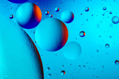 Abstract background with colorful gradient colors. Oil drops in water abstract psychedelic pattern...