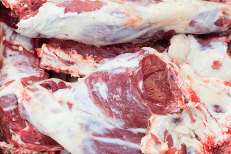 Fresh raw lamb mutton meat close up as a backgroundの写真素材