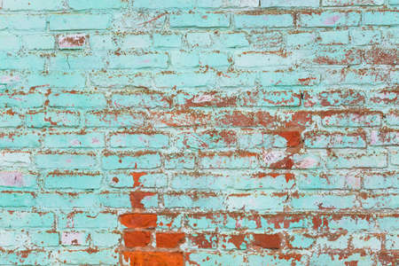 Old green painted brick wall. Abstract brick wall texture background.の写真素材
