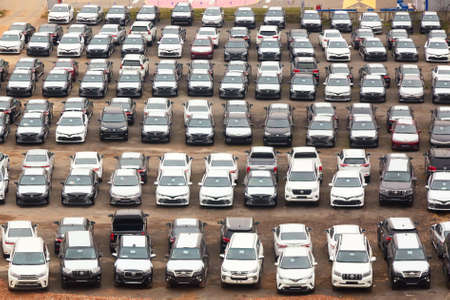 Moscow, Russia - October, 2018: Many Toyota cars on reseller parking in rows from above. Toyota is a...