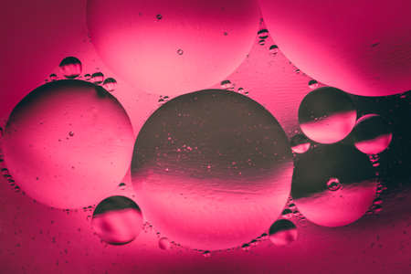 Space or planets universe cosmic abstract background. Abstract molecule structure. Water bubbles. Macro shot of air or molecule. Abstract space pink and black gradient background.の写真素材