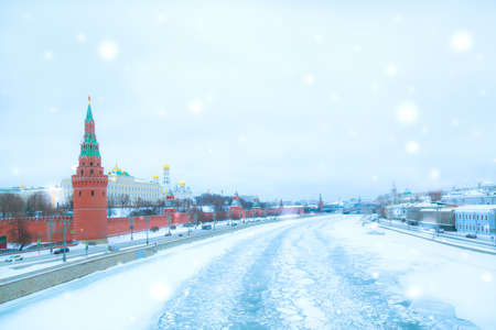 Moscow winter snowy cityscape. View of the Kremlin with the Moscow River in winter