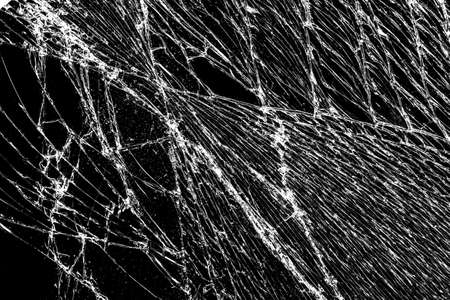 Black cracked Touch Screen Phone display background. Texture for your project. Broken black glass abstract backgroundの写真素材