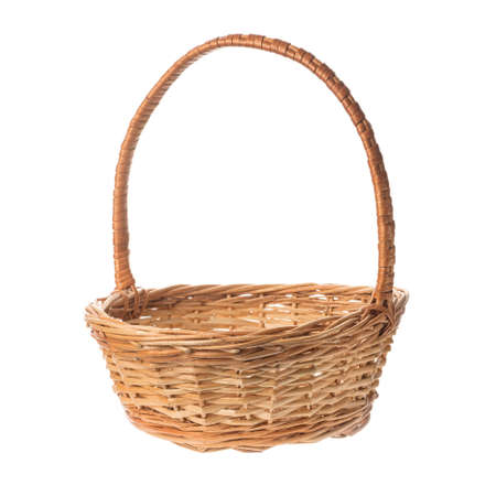 Empty wicker basket isolated on white background.の写真素材