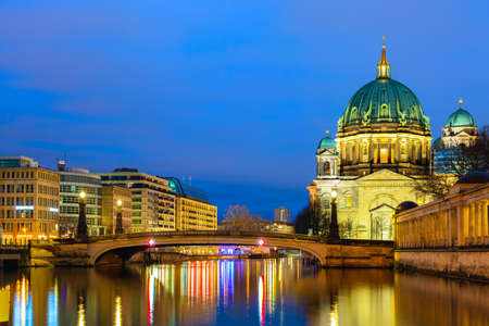 Berlin cathedral Berliner Dom in the evening twilight sunset with Spree river and reflections. Berlin, Germanyの写真素材