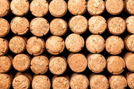 Texture background of champagne wine corks. Used wine corks alcohol background