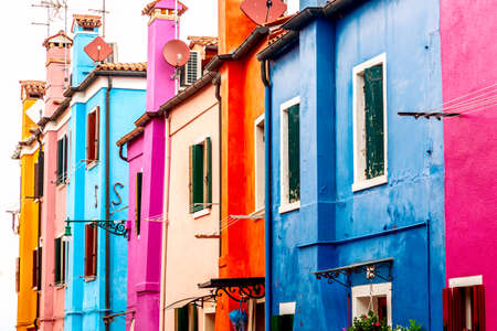 Beautiful vibrant colorful houses in Burano near Venice in Italyの写真素材