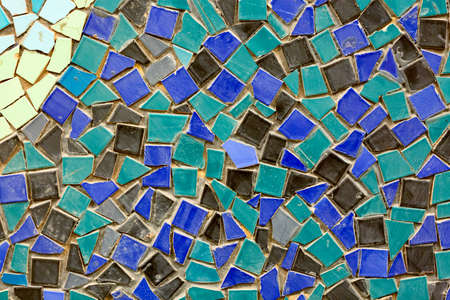 Old ceramic mosaic wall as a background