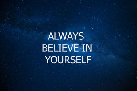Always believe in yourself against night sky with stars. Motivational and inspiration quote. Motivation in life and businessの写真素材
